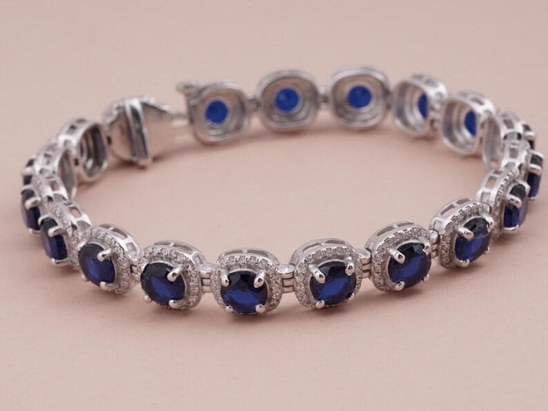 Oval Blue Sapphire Tennis Bracelet with Diamond Halo