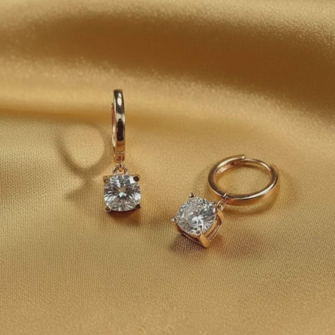 Dainty Round Cut Moissanite Huggie Hoops — View 4